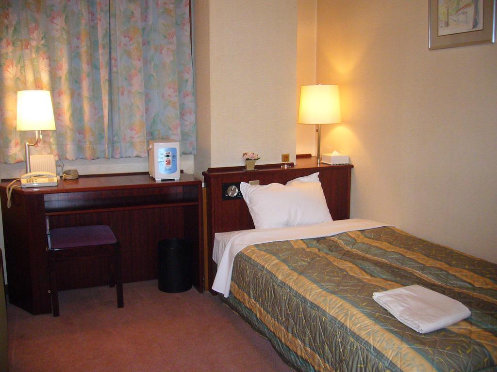 City Hotel Ikeda Окаяма Номер фото